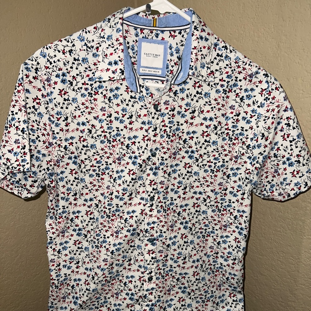 Used Men’s button up shirt.